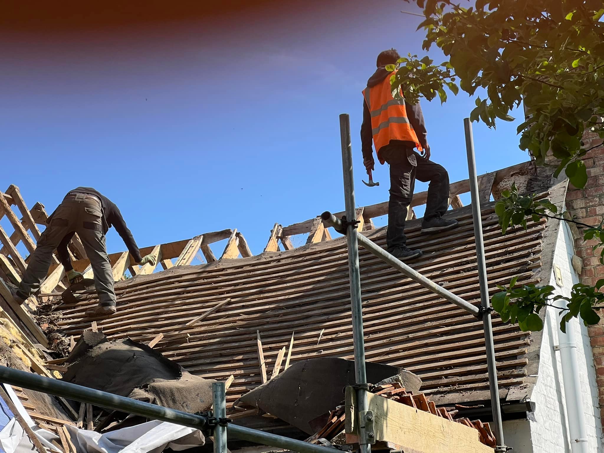Professional roofers working on a property in London - KS Roof Master