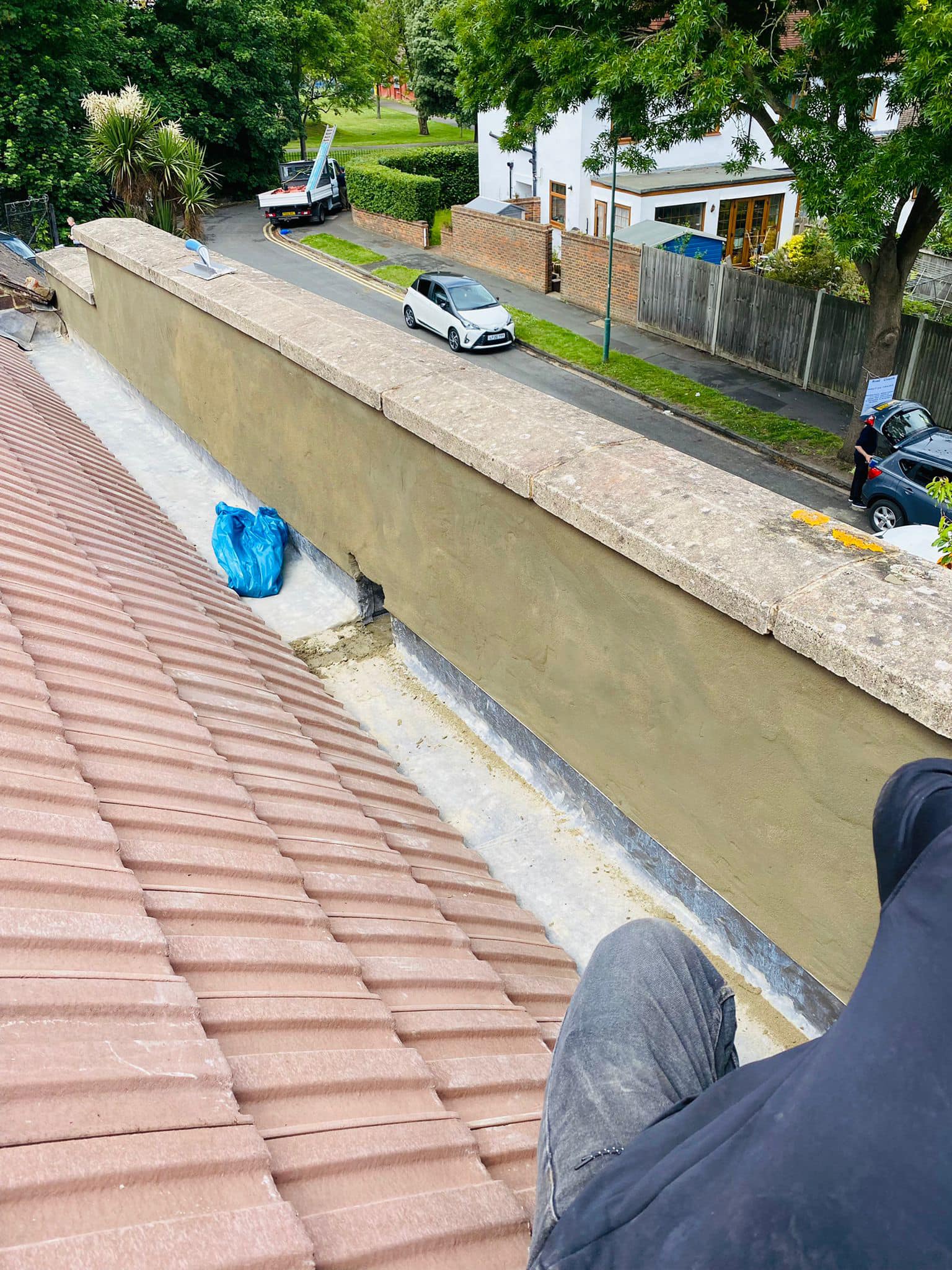Professional roofers working on a property in London - KS Roof Master