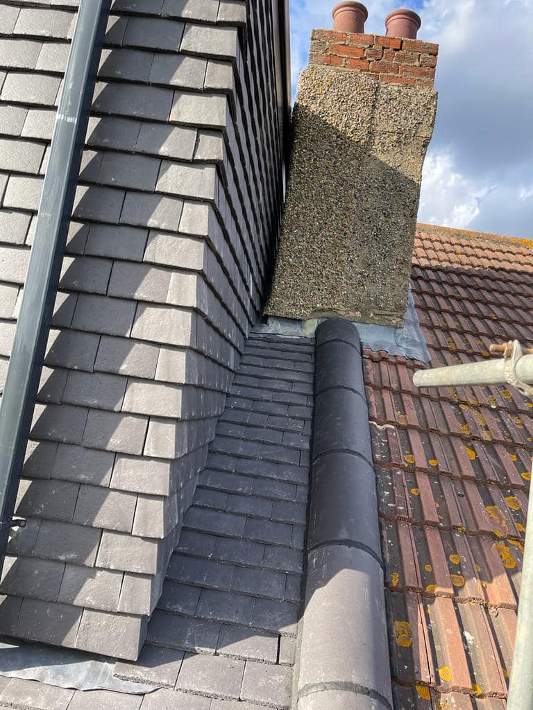 Professional roofers working on a property in London - KS Roof Master