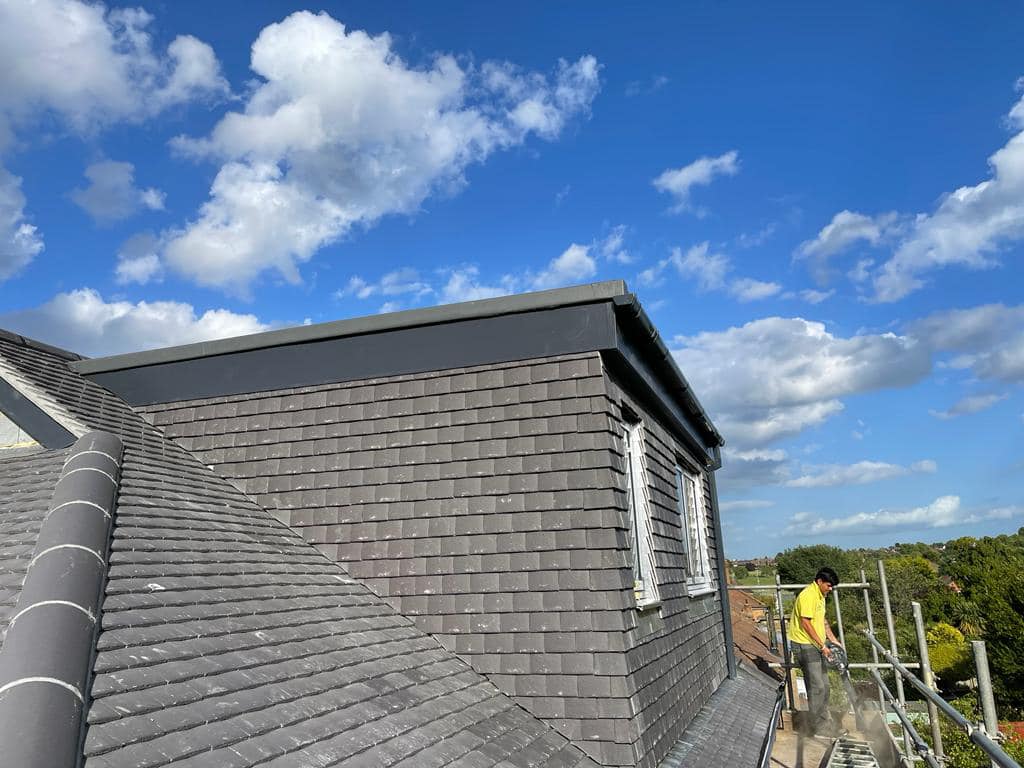 Professional roofers working on a property in London - KS Roof Master
