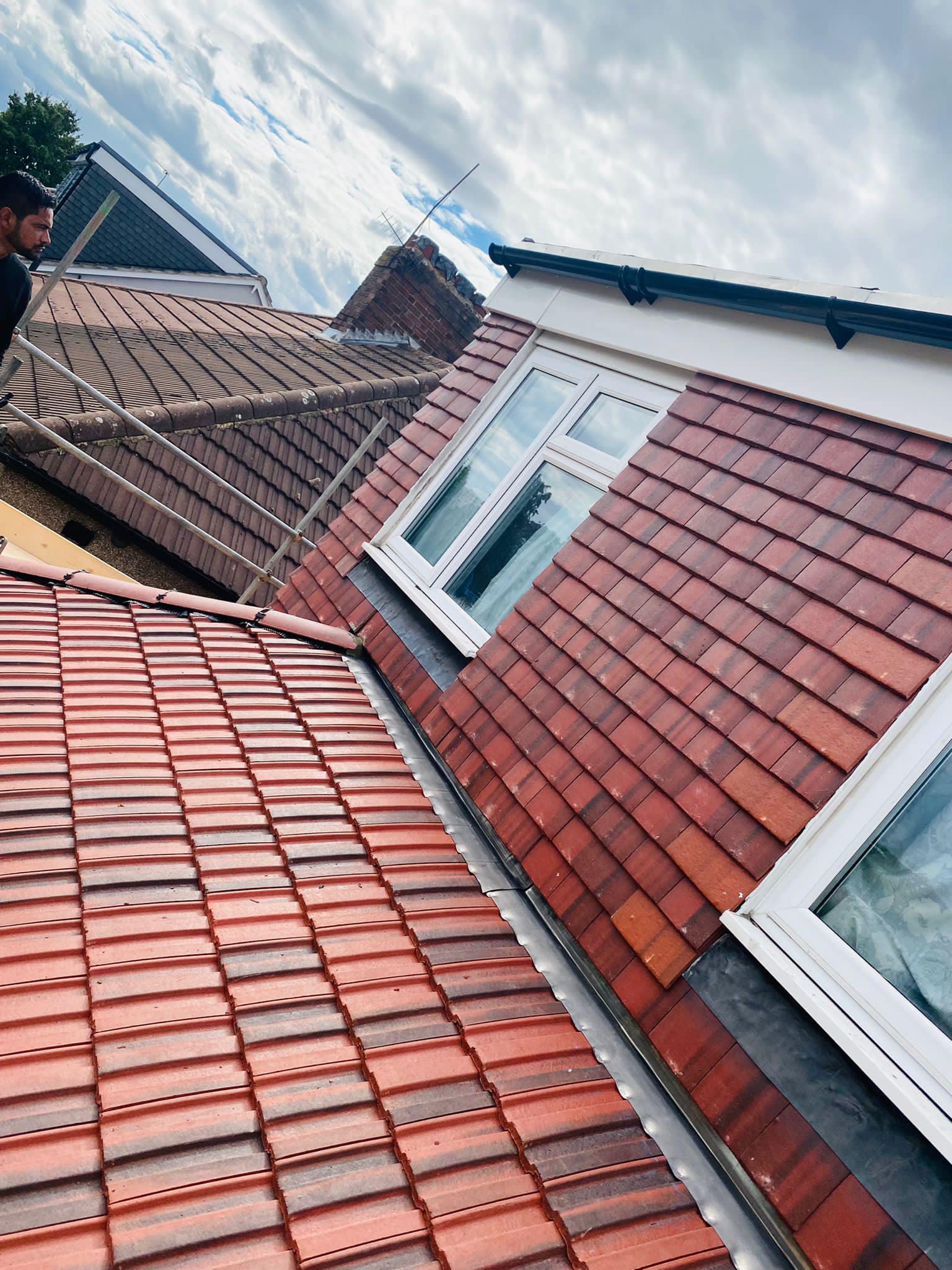 Professional roofers working on a property in London - KS Roof Master
