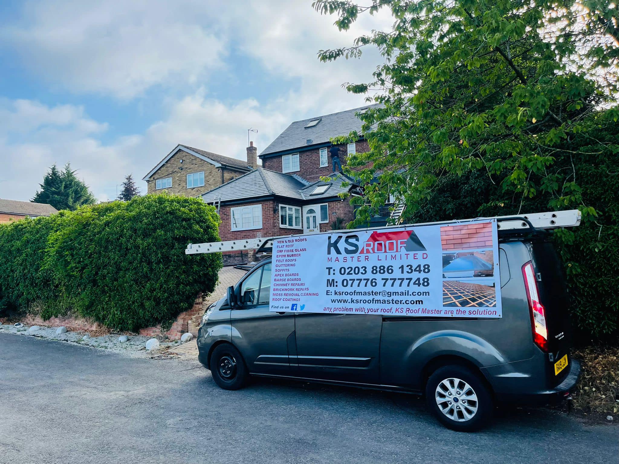 Professional roofers working on a property in London - KS Roof Master