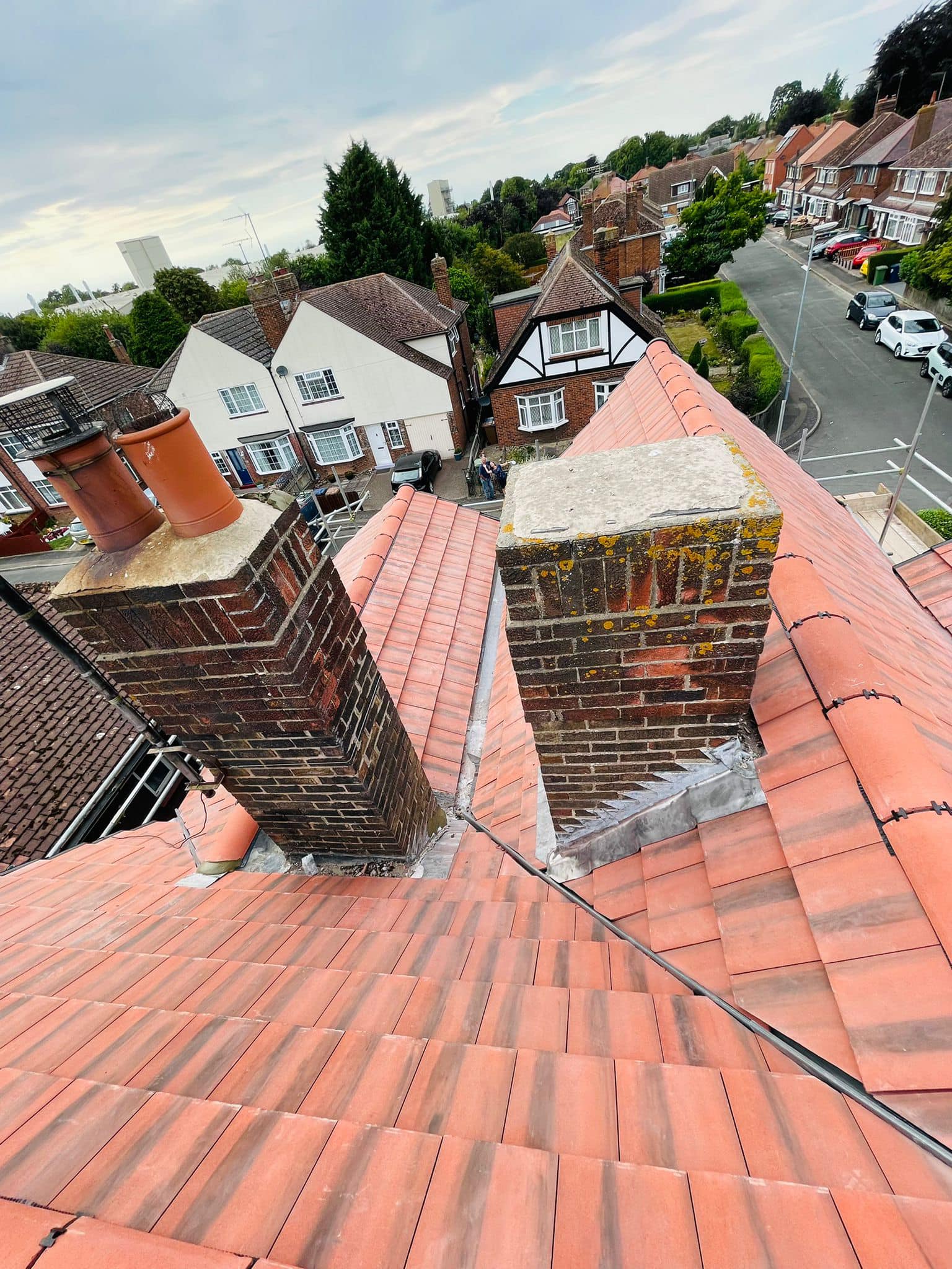 Professional roofers working on a property in London - KS Roof Master