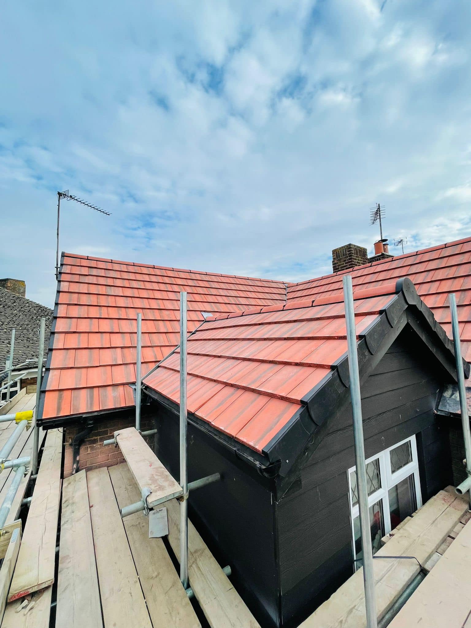 Professional roofers working on a property in London - KS Roof Master