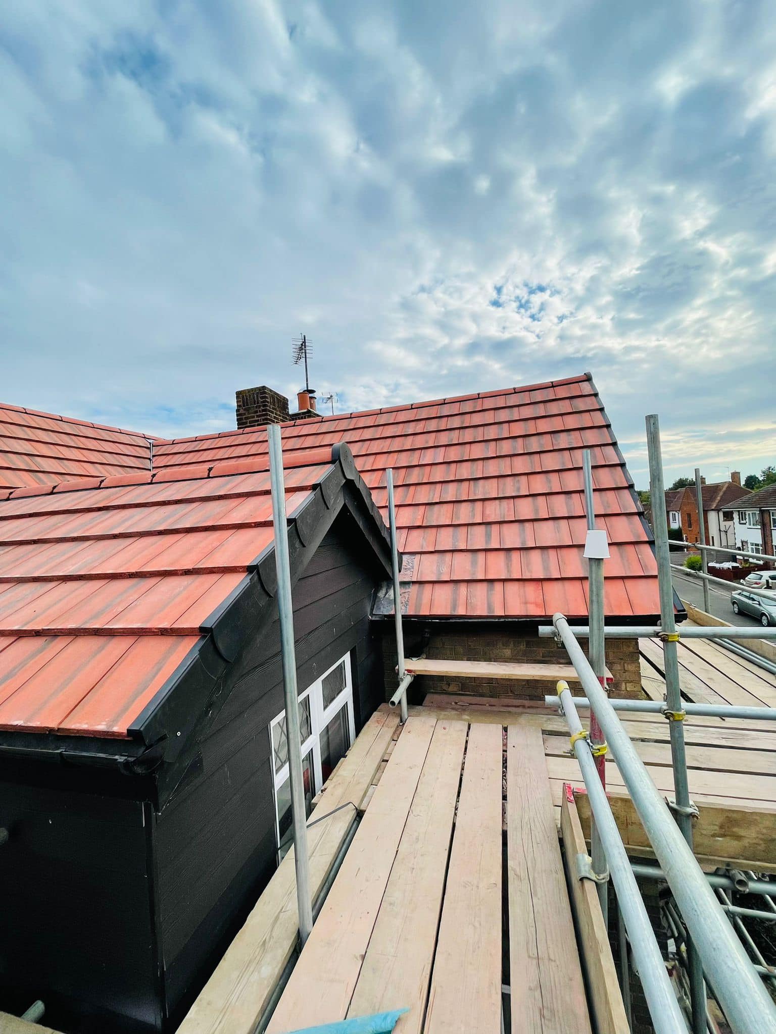 Professional roofers working on a property in London - KS Roof Master