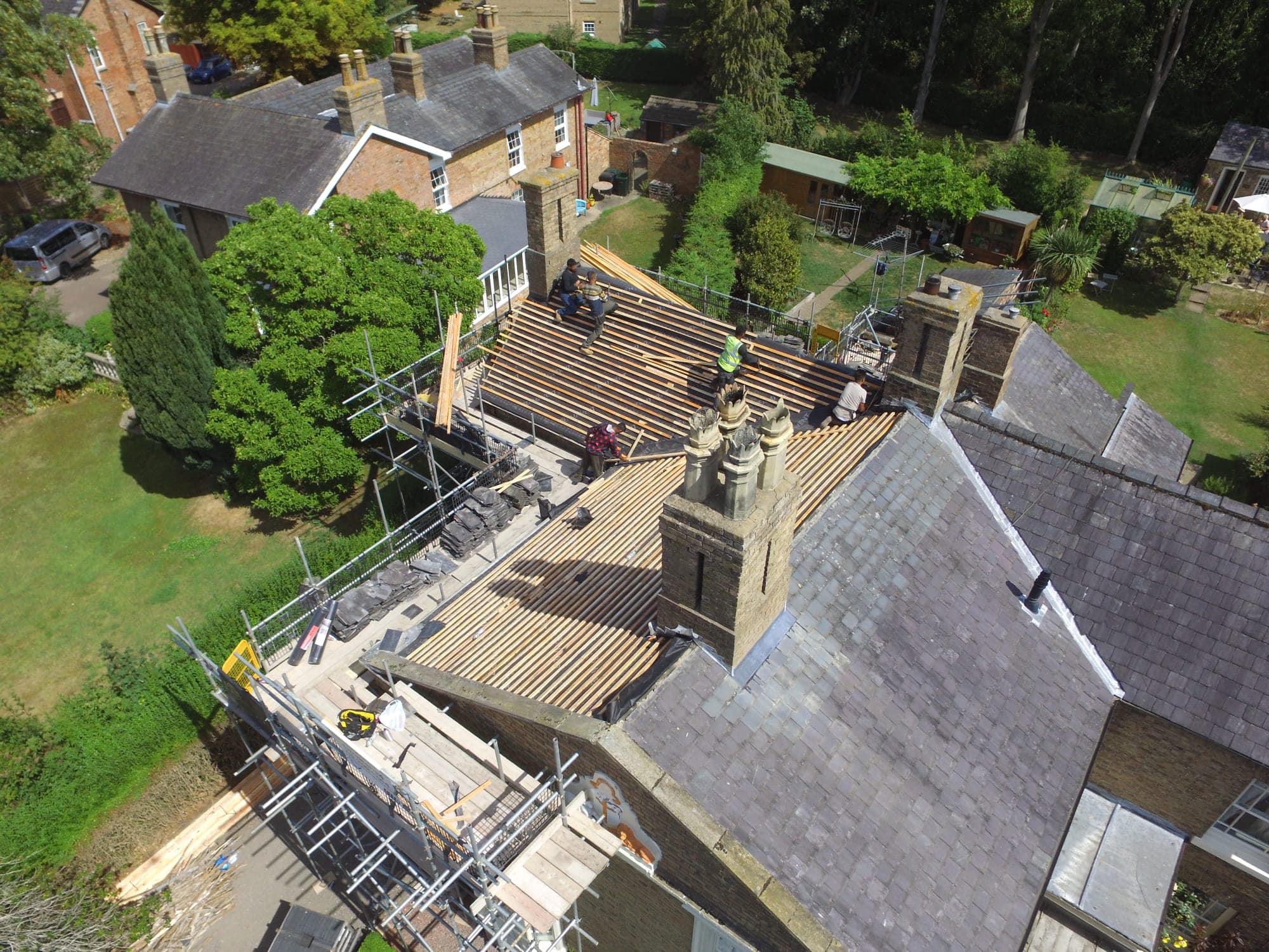 Professional roofers working on a property in London - KS Roof Master