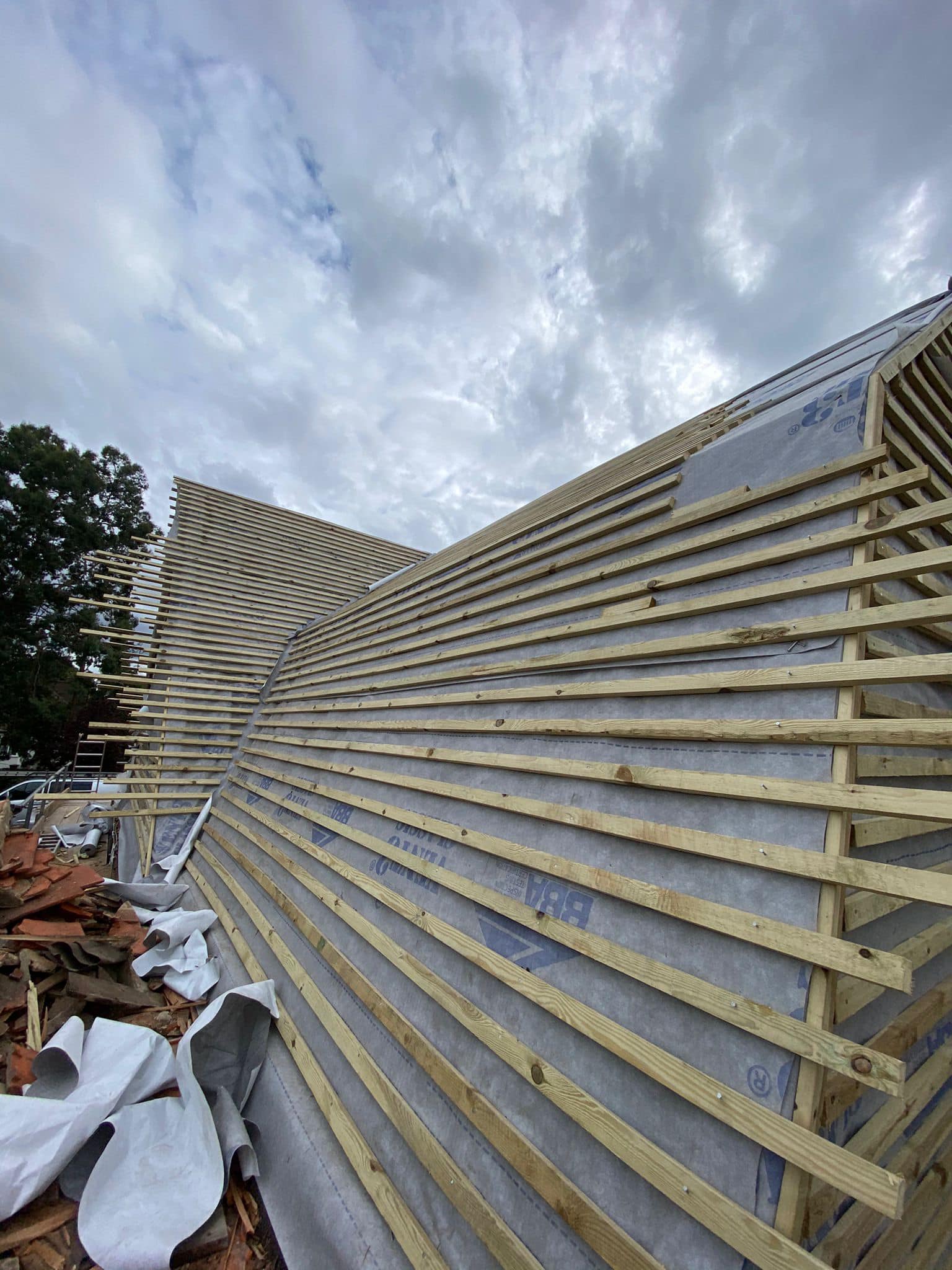 Professional roofers working on a property in London - KS Roof Master