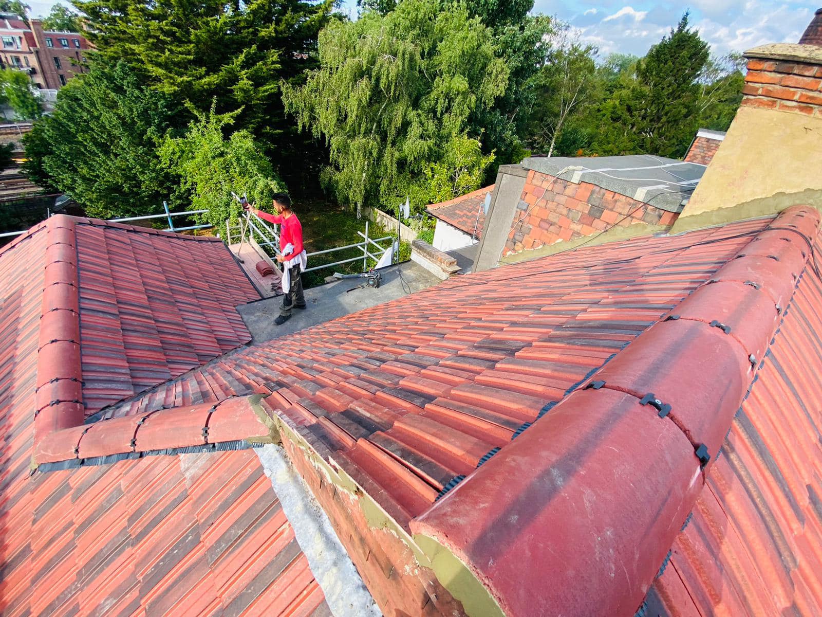 Professional roofers working on a property in London - KS Roof Master