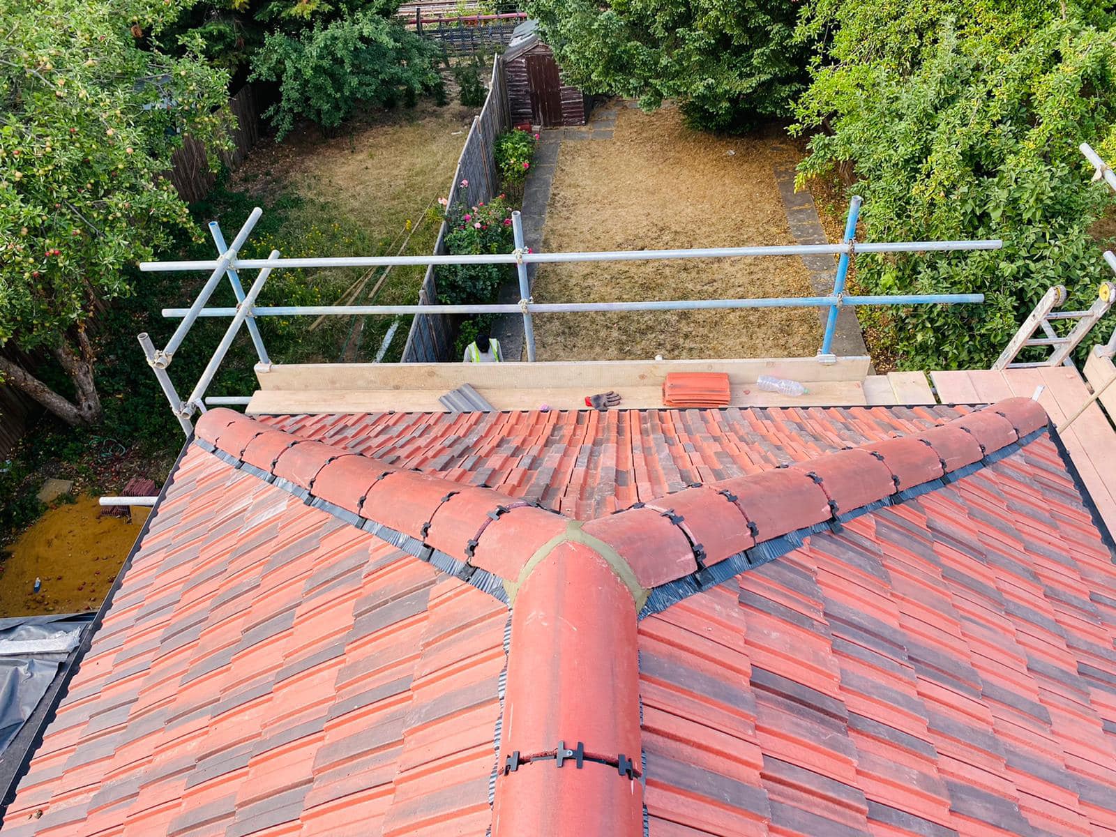 Professional roofers working on a property in London - KS Roof Master