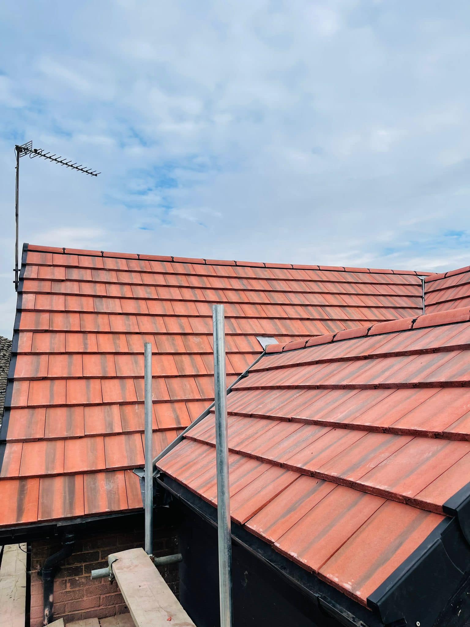 Professional roofers working on a property in London - KS Roof Master