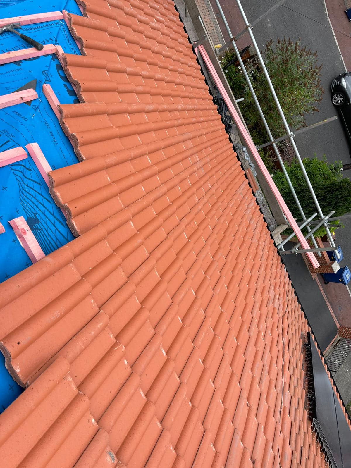Professional roofers working on a property in London - KS Roof Master