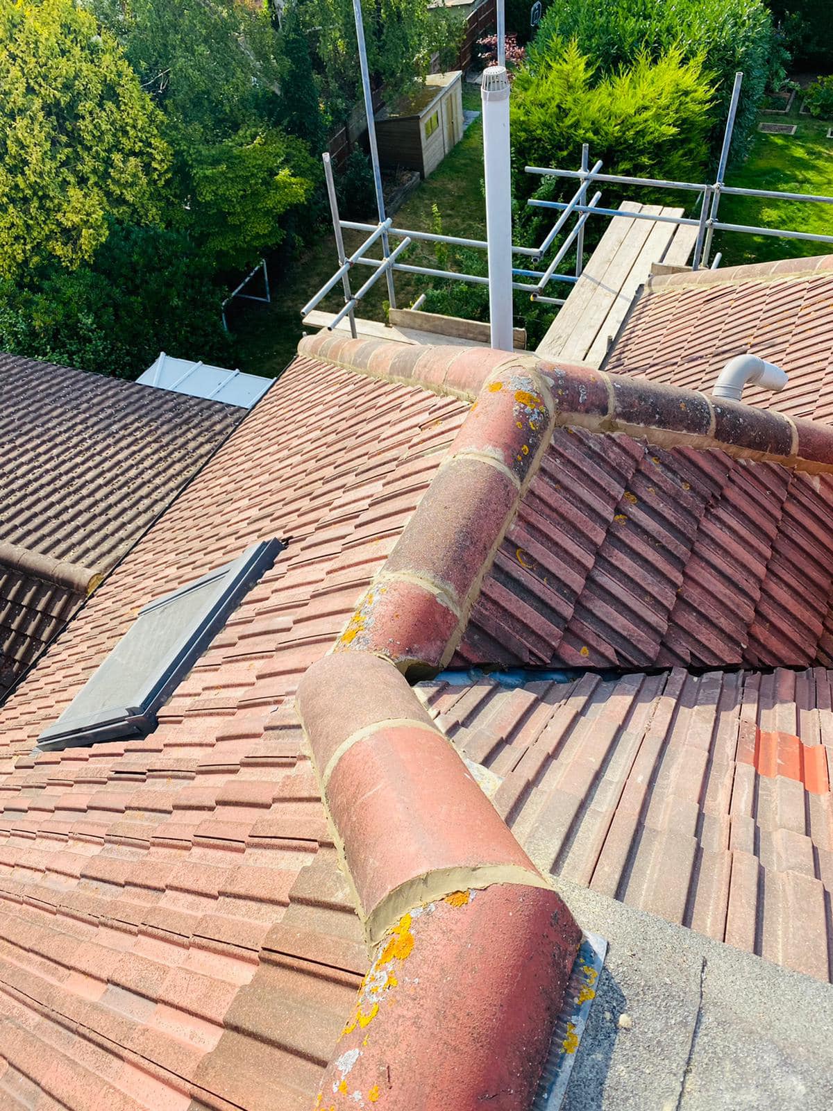 Professional roofers working on a property in London - KS Roof Master
