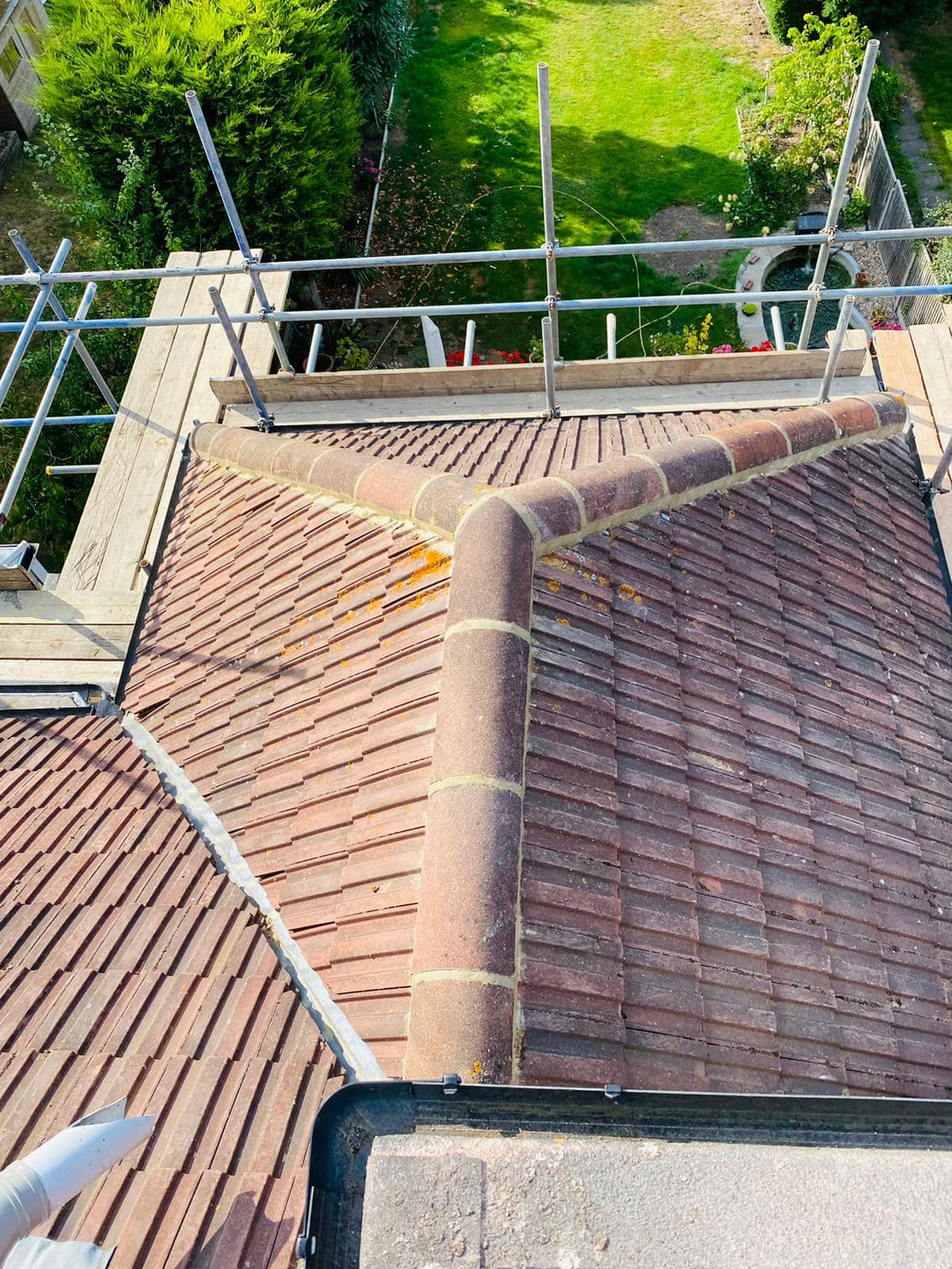 Professional roofers working on a property in London - KS Roof Master