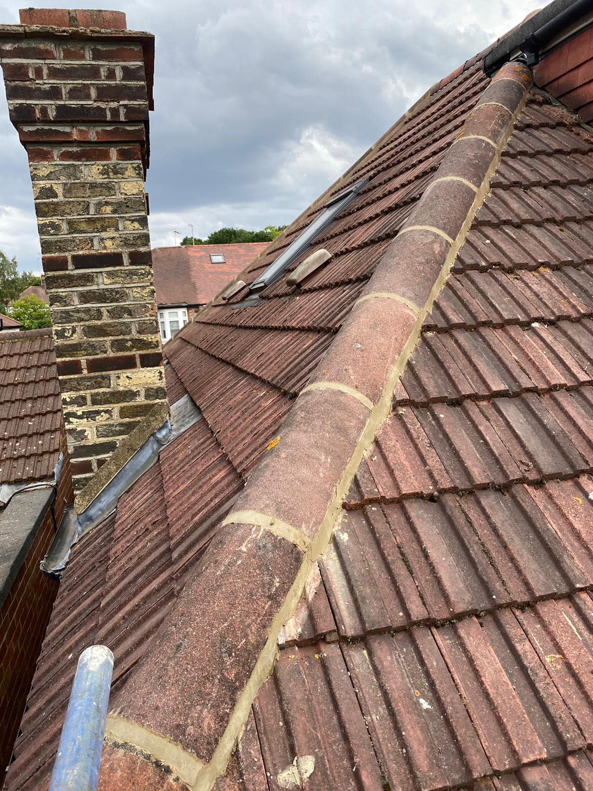 Professional roofers working on a property in London - KS Roof Master