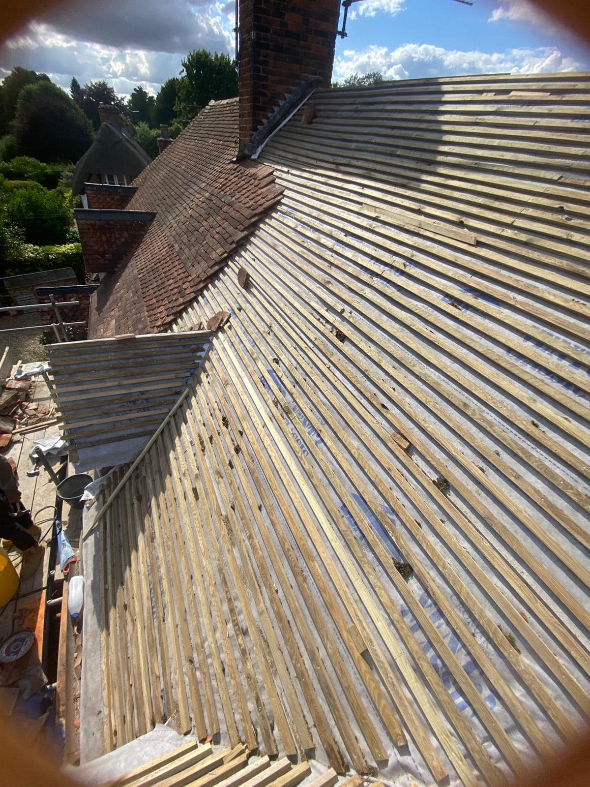 Professional roofers working on a property in London - KS Roof Master