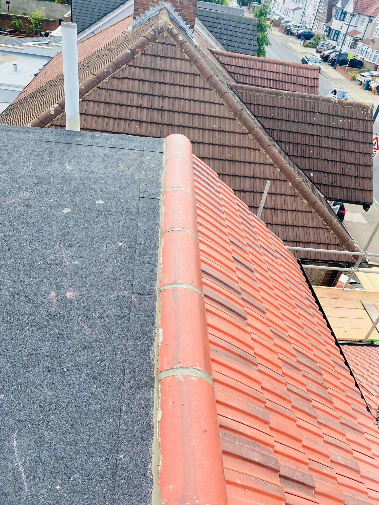 Professional roofers working on a property in London - KS Roof Master