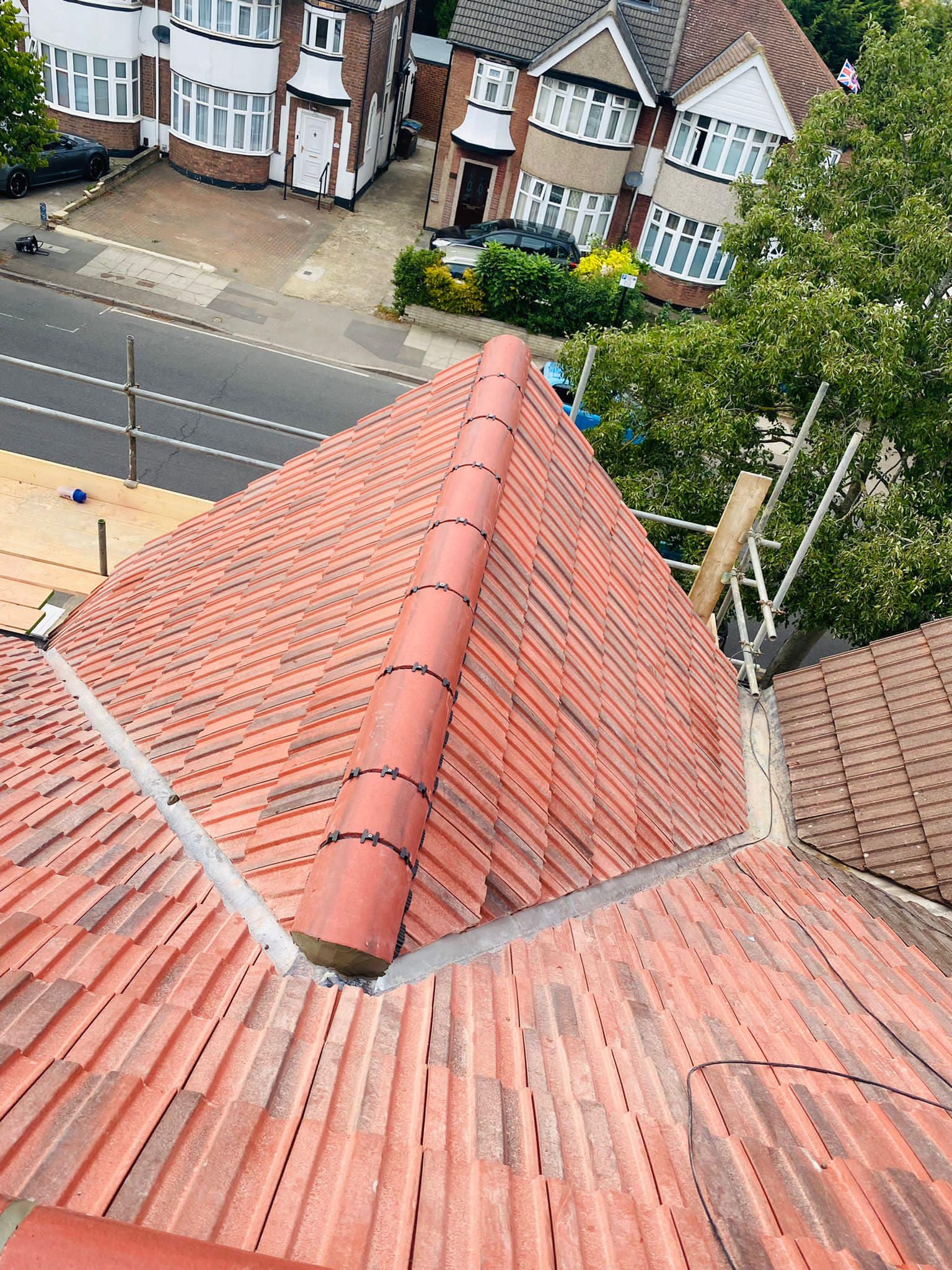 Professional roofers working on a property in London - KS Roof Master
