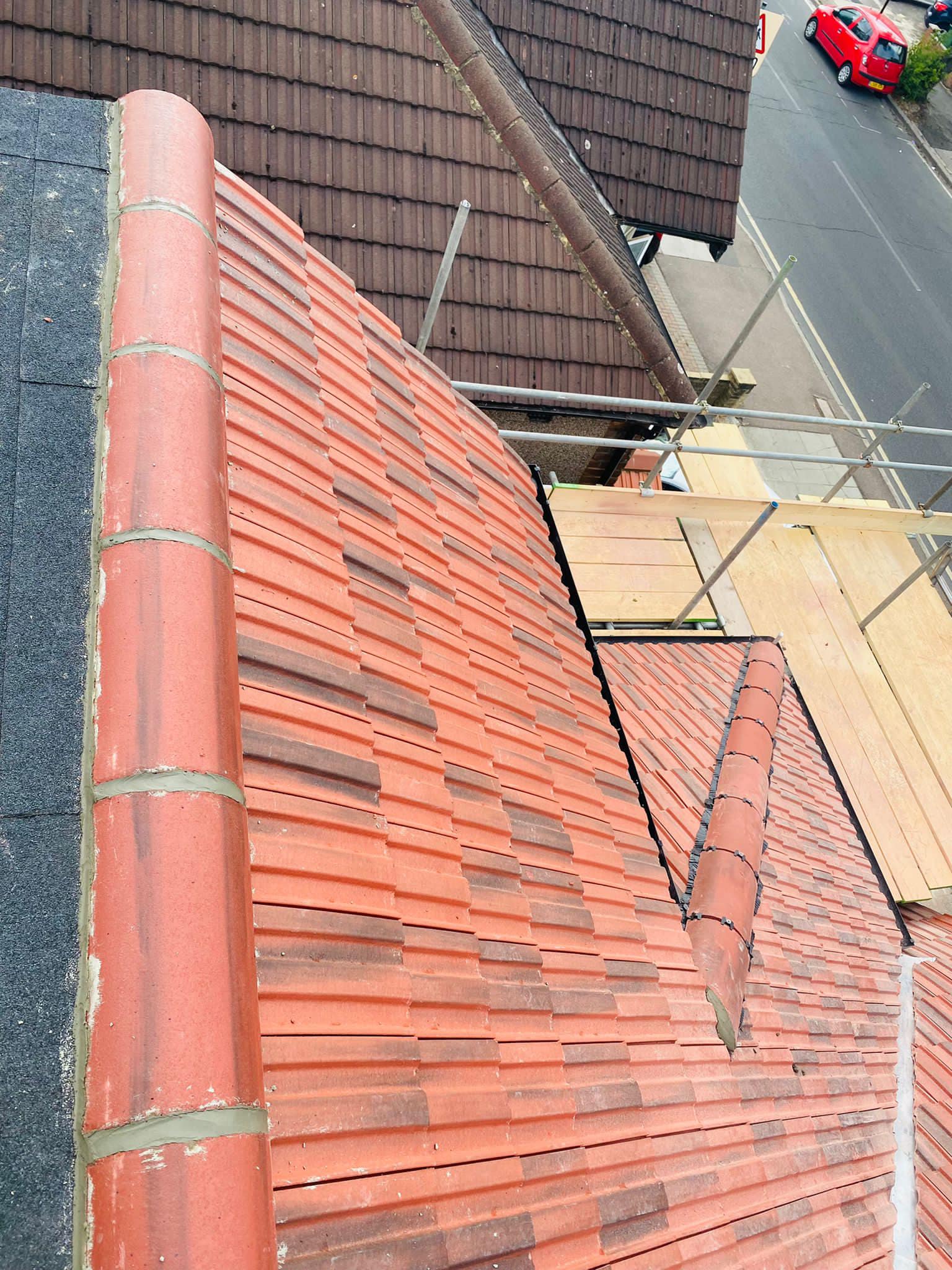Professional roofers working on a property in London - KS Roof Master