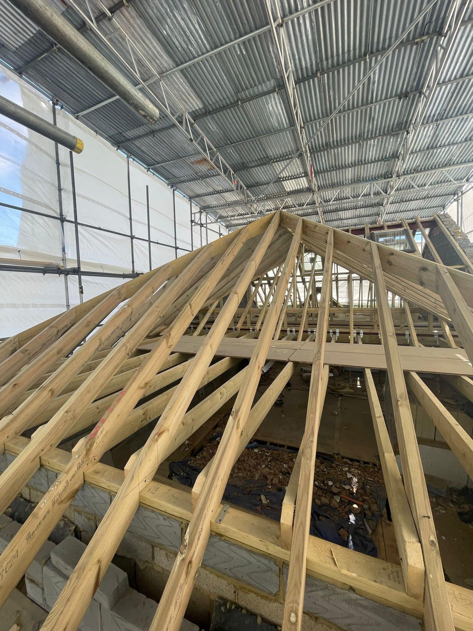 Professional roofers working on a property in London - KS Roof Master