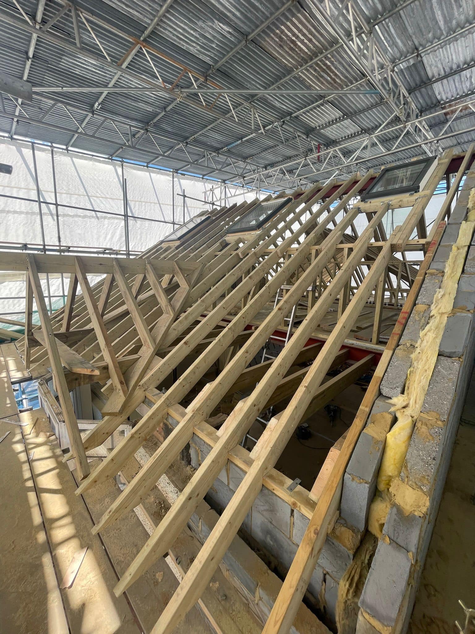 Professional roofers working on a property in London - KS Roof Master