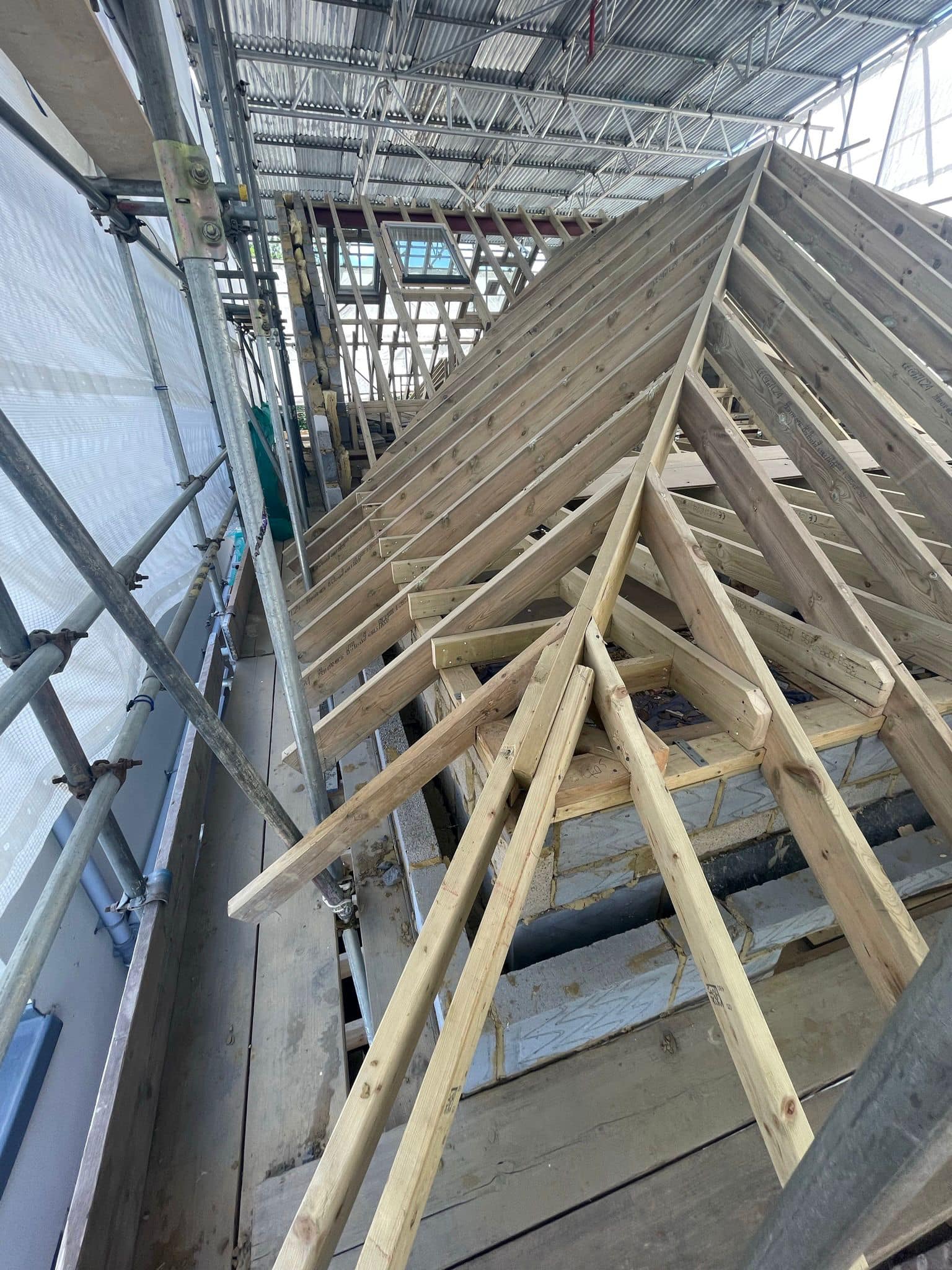 Professional roofers working on a property in London - KS Roof Master