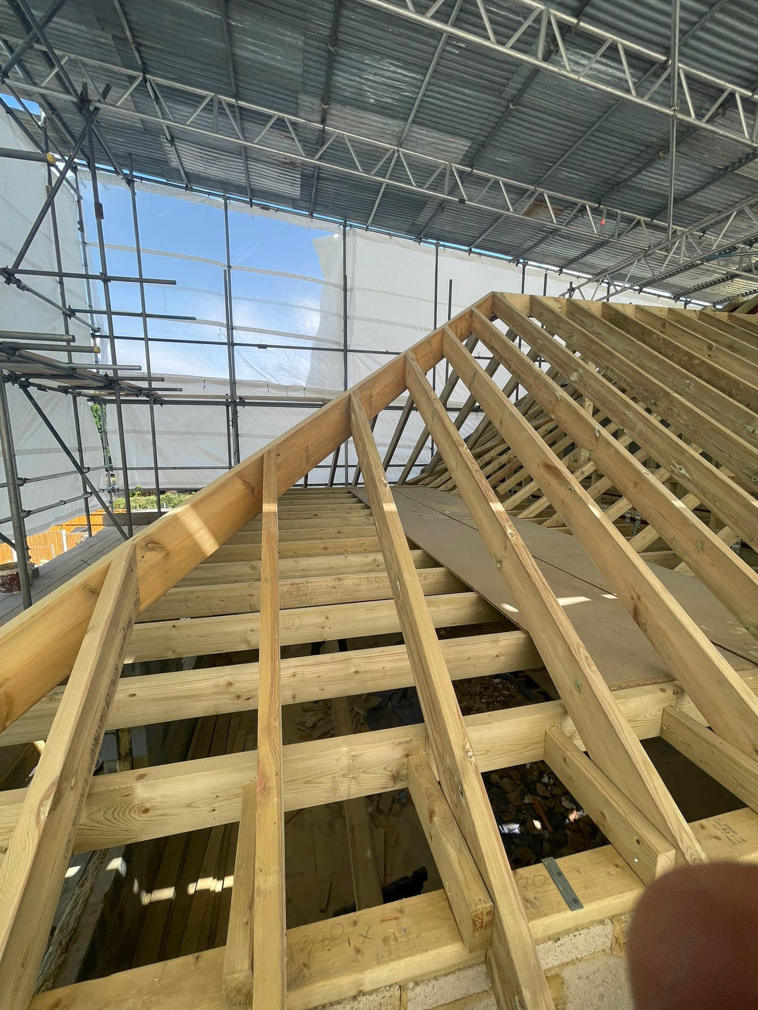 Professional roofers working on a property in London - KS Roof Master