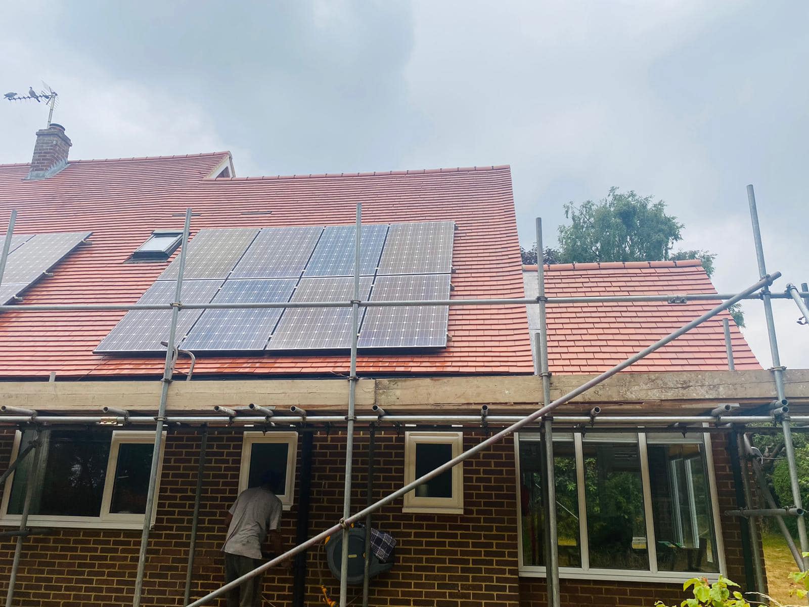 Professional roofers working on a property in London - KS Roof Master