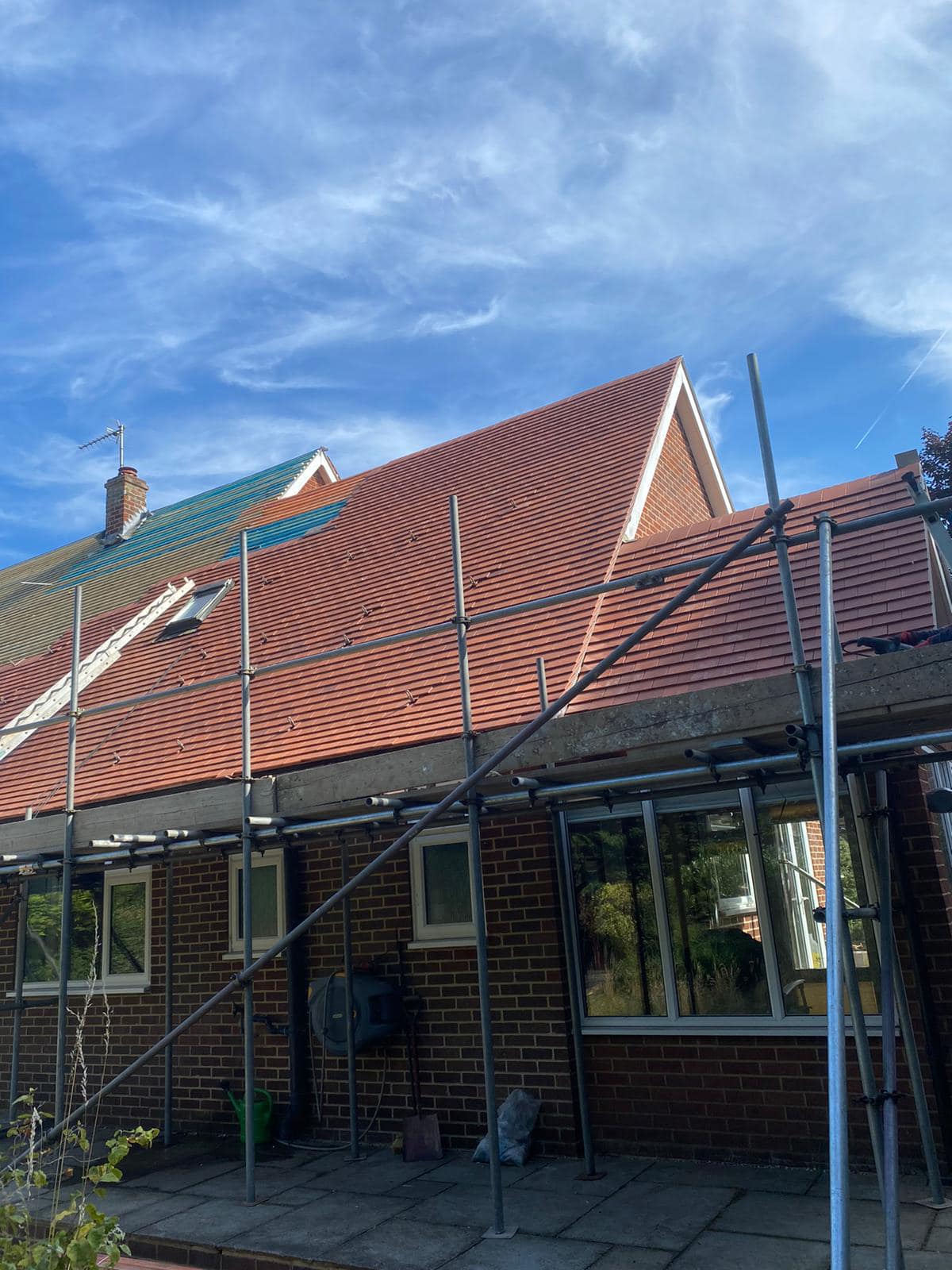 Professional roofers working on a property in London - KS Roof Master
