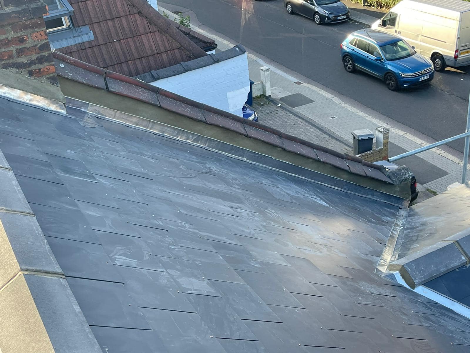 Professional roofers working on a property in London - KS Roof Master