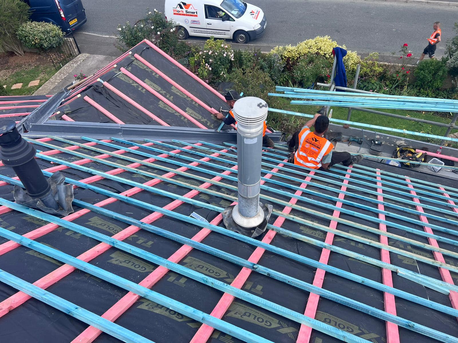 Professional roofers working on a property in London - KS Roof Master