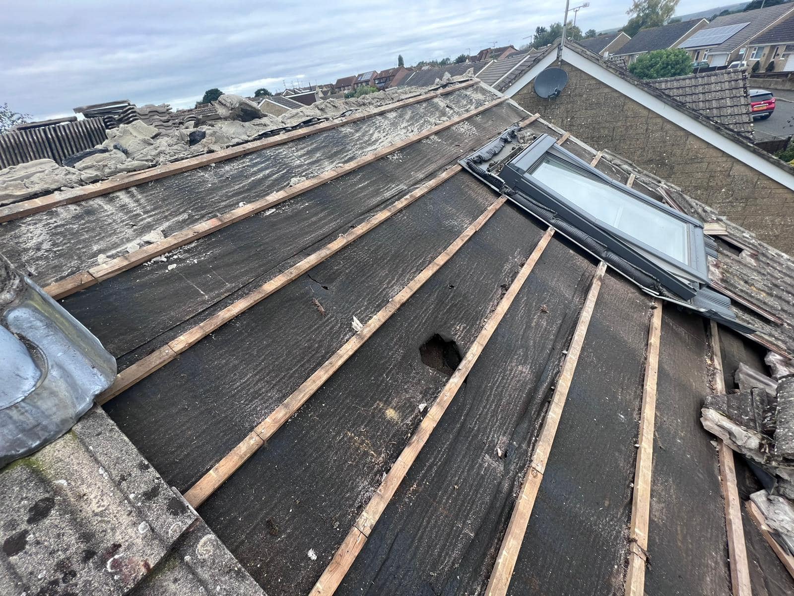 Professional roofers working on a property in London - KS Roof Master