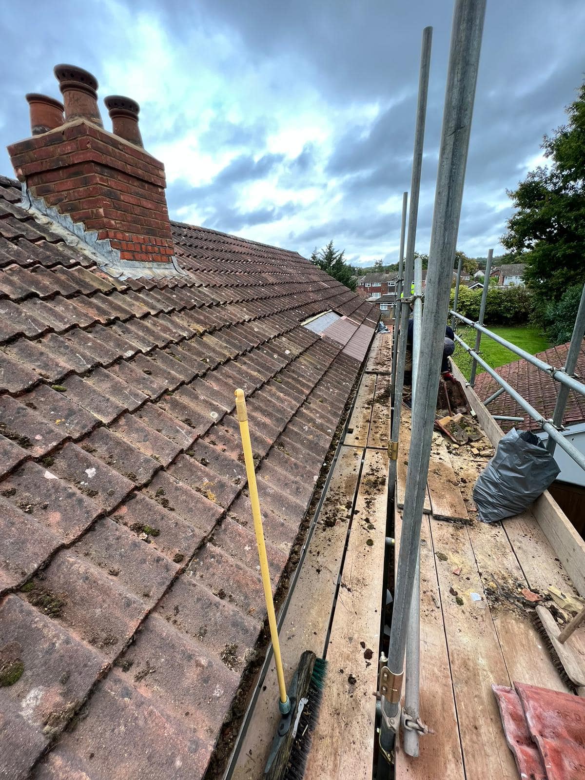 Professional roofers working on a property in London - KS Roof Master