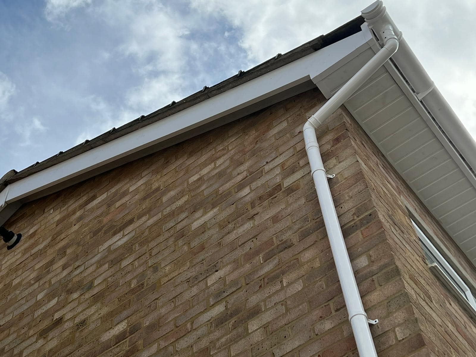 Professional roofers working on a property in London - KS Roof Master
