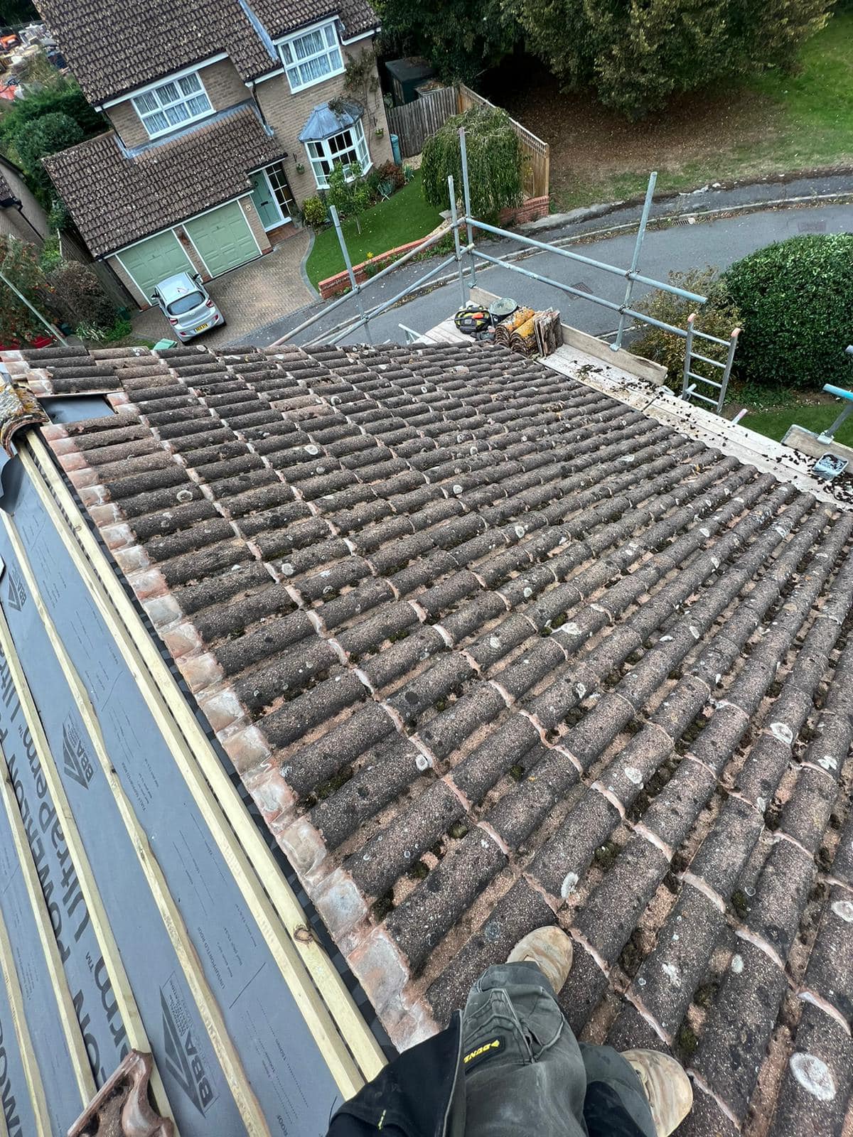 Professional roofers working on a property in London - KS Roof Master