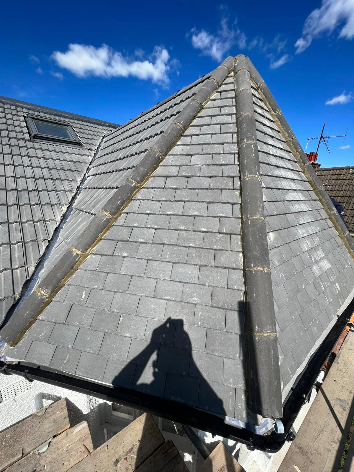 Professional roofers working on a property in London - KS Roof Master