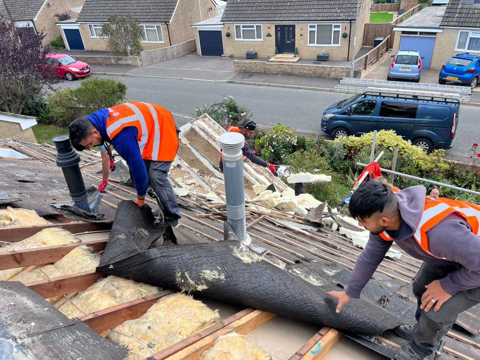 Professional roofers working on a property in London - KS Roof Master