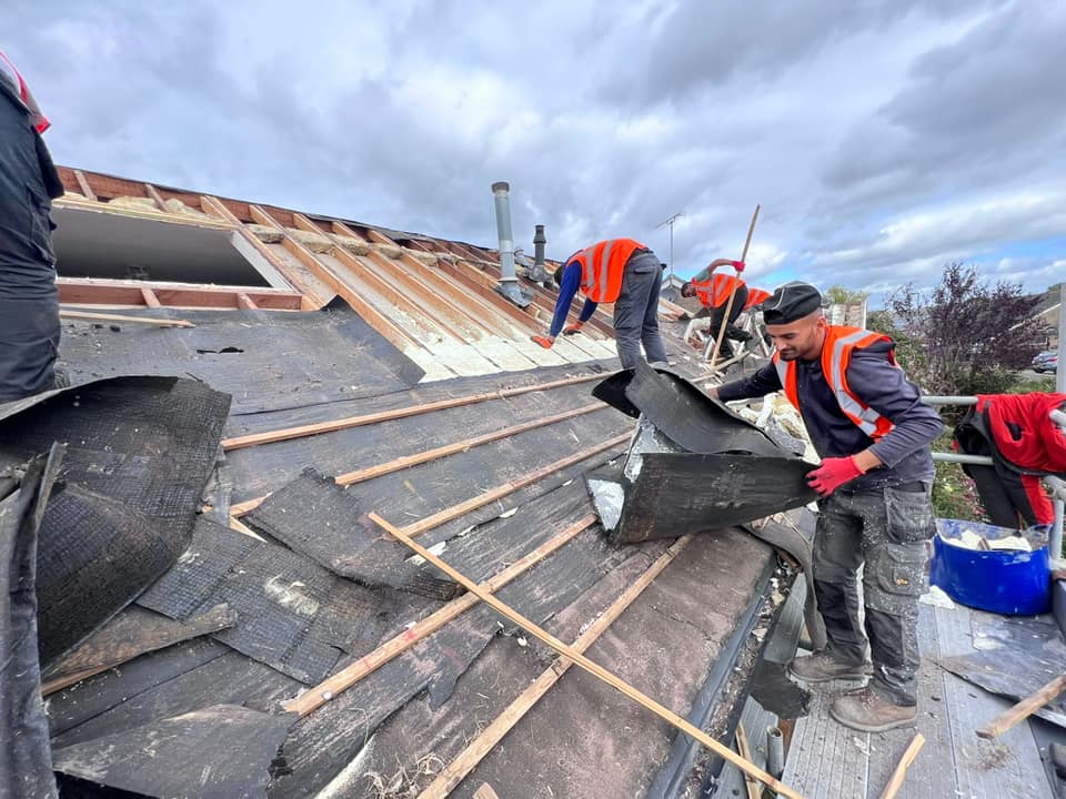 Professional roofers working on a property in London - KS Roof Master