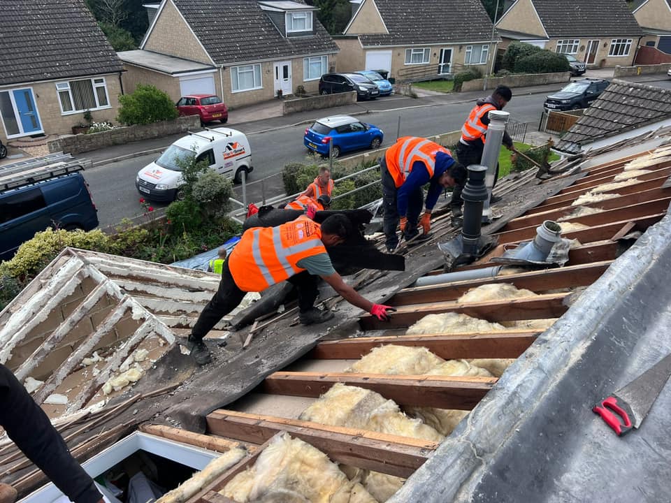 Professional roofers working on a property in London - KS Roof Master