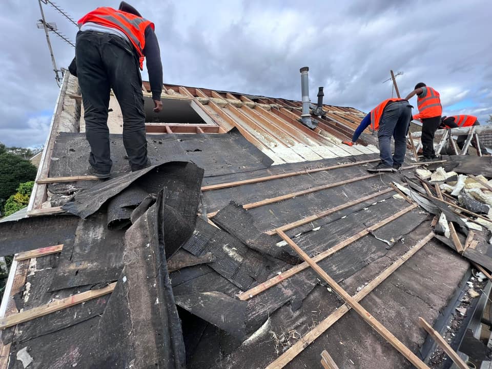 Professional roofers working on a property in London - KS Roof Master