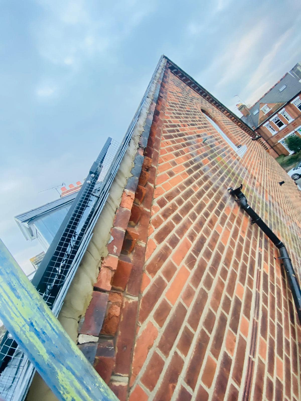 Professional roofers working on a property in London - KS Roof Master