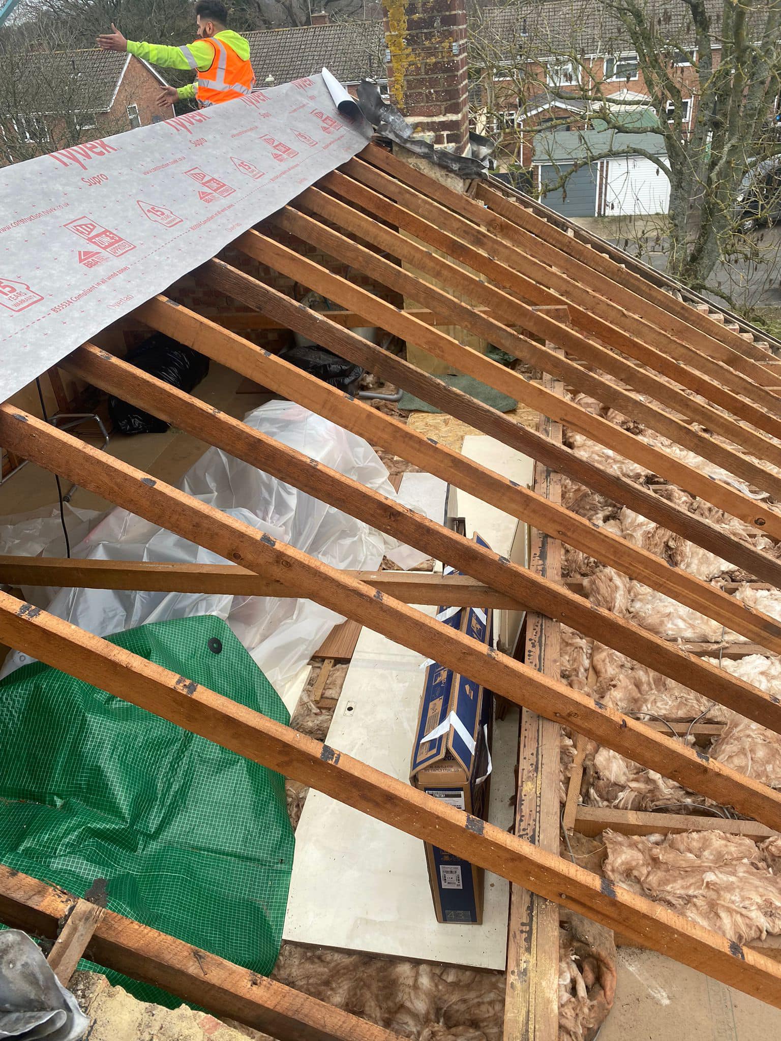 Professional roofers working on a property in London - KS Roof Master