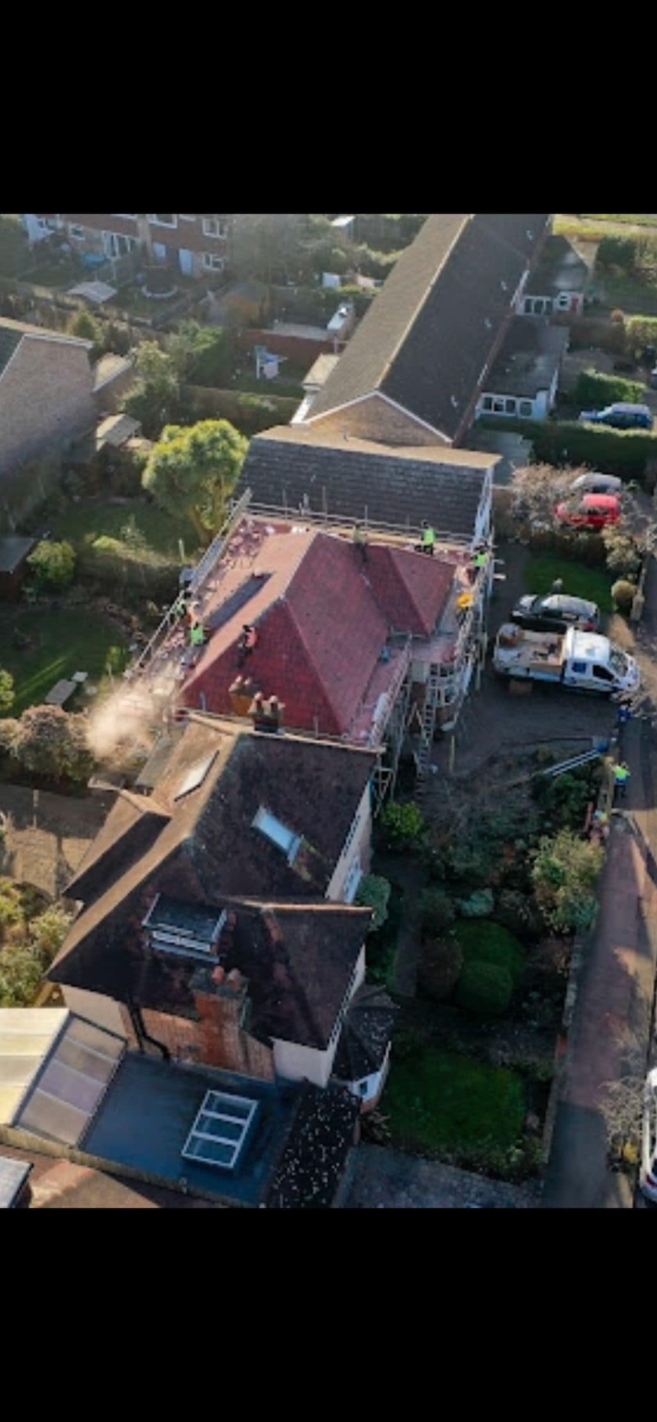 Professional roofers working on a property in London - KS Roof Master