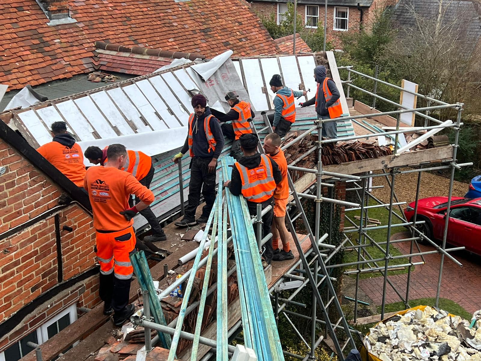 Professional roofers working on a property in London - KS Roof Master