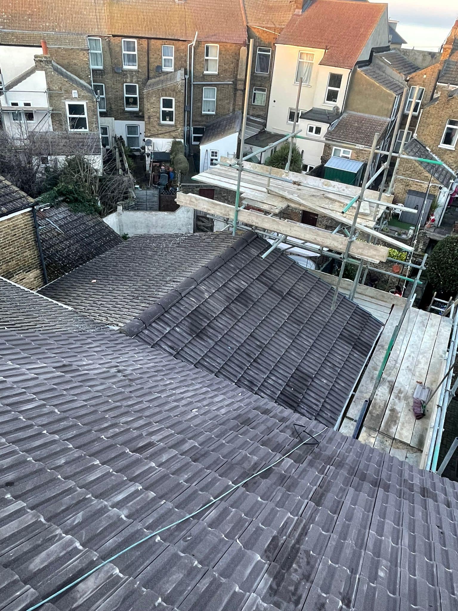 Professional roofers working on a property in London - KS Roof Master