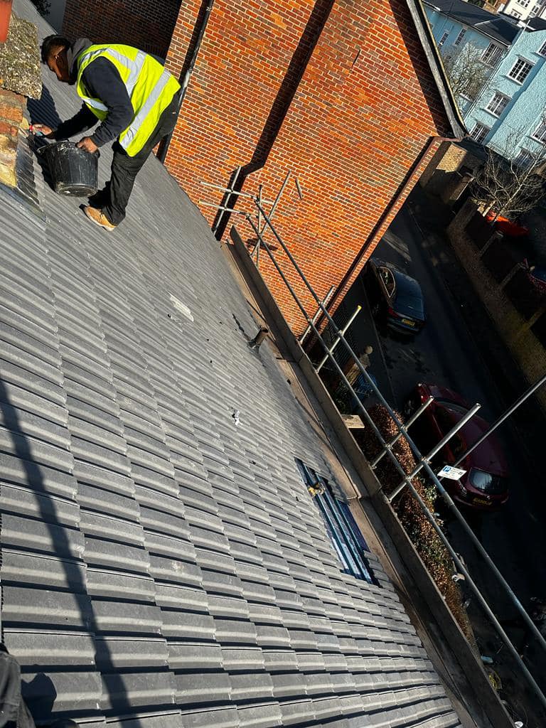 Professional roofers working on a property in London - KS Roof Master