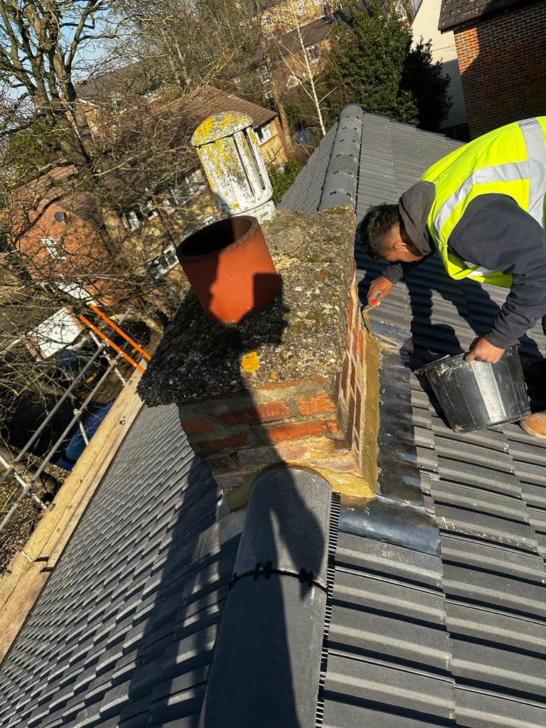 Professional roofers working on a property in London - KS Roof Master