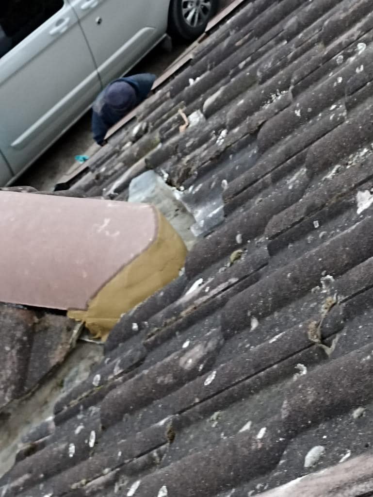 Professional roofers working on a property in London - KS Roof Master