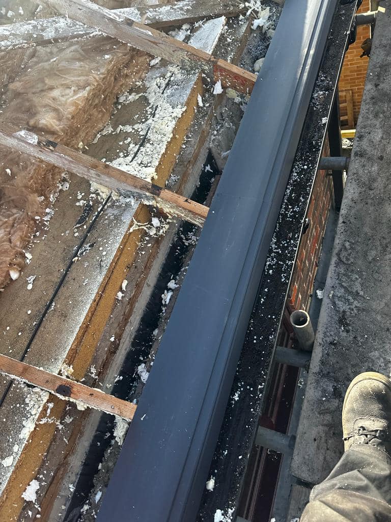 Professional roofers working on a property in London - KS Roof Master