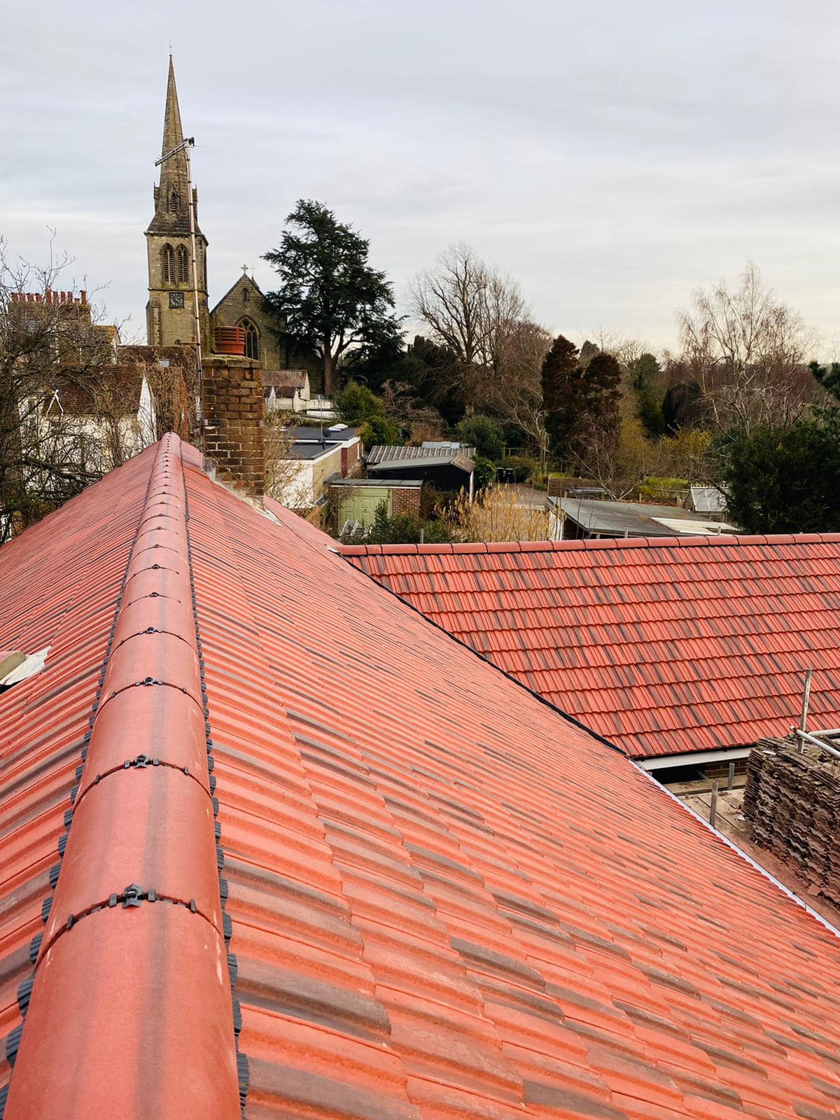 Professional roofers working on a property in London - KS Roof Master