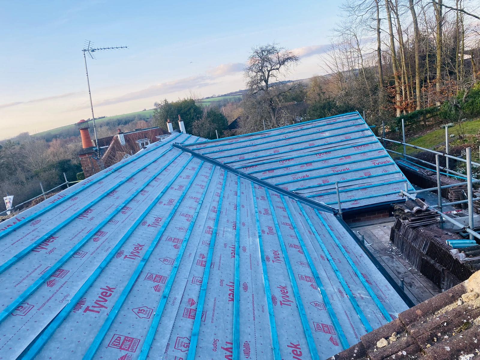 Professional roofers working on a property in London - KS Roof Master